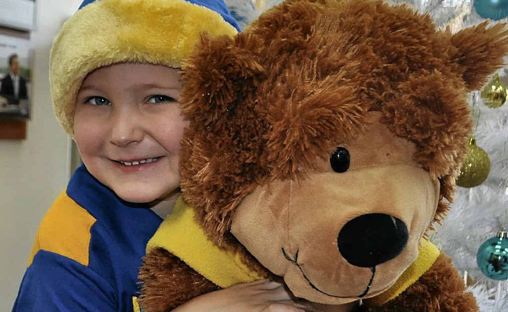 Help disadvantaged kids wake up to a present this Christmas. Henry McMillan shows just how much a teddy and book can mean on Christmas morning.